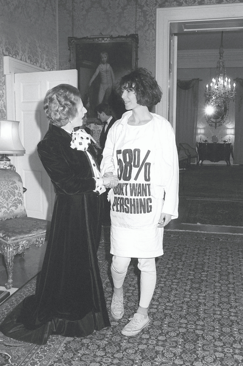 Katharine Hamnett meets Margaret Thatcher at a reception at 10 Downing Street wearing a T-shirt with a nuclear missile protest message