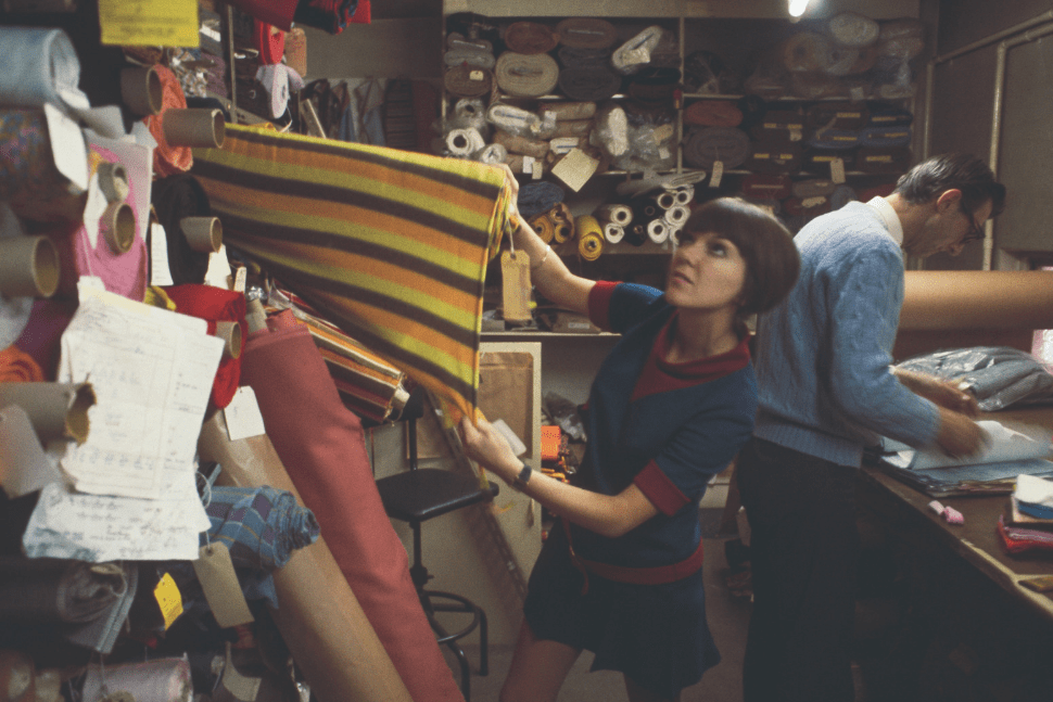 Mary Quant selecting fabric, 1967