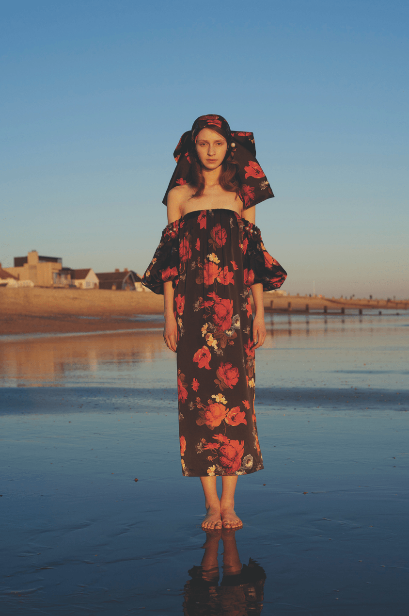 Model Wears Black And Red Floral Off-The-Shoulder Dress And Matching Headscarf From The Mother Of Pearl Ss19 Collection