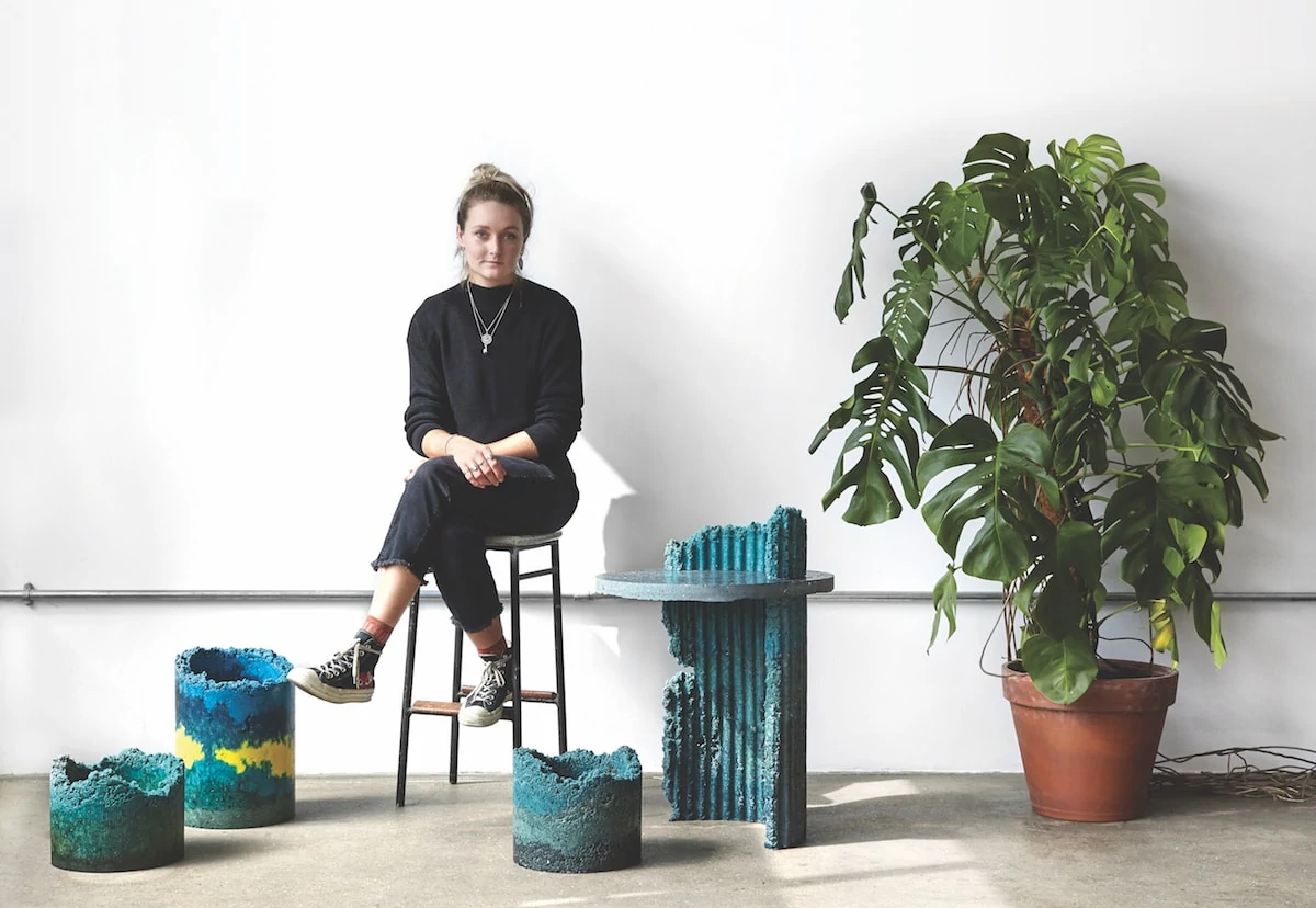 Designer Charlotte Kidger Sits With Items From Her Industrial Craft Collection