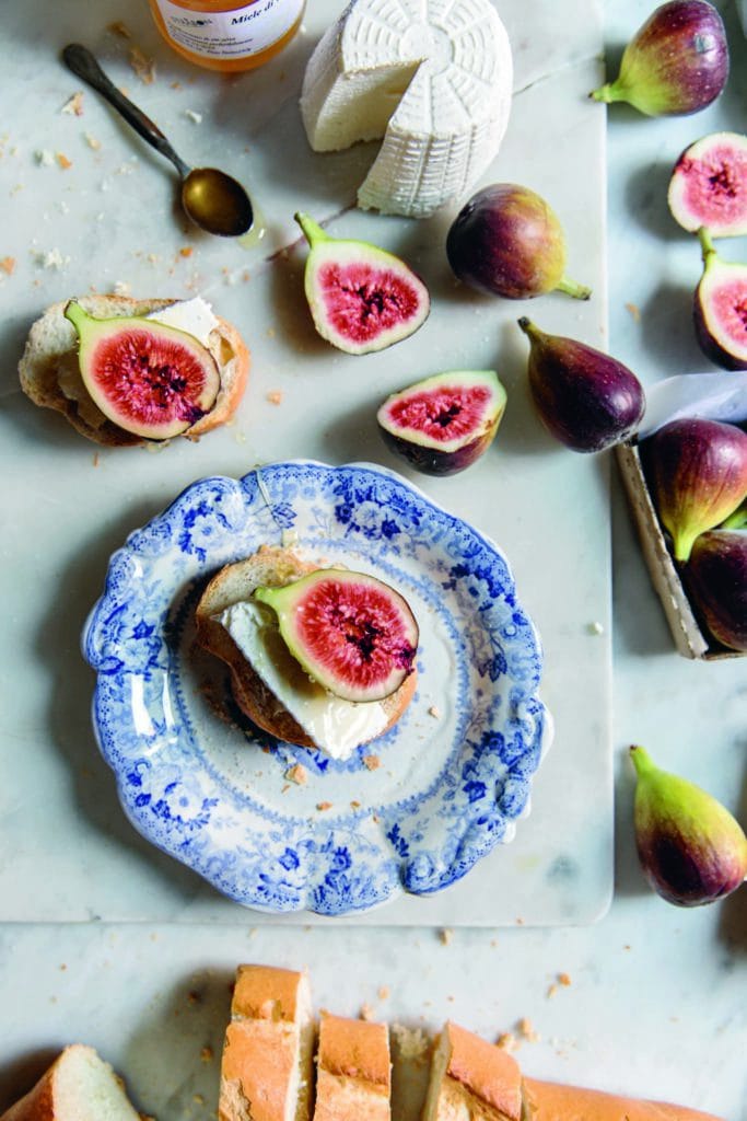 Skye McAlpine’s fig crostini served on a blue and white plate